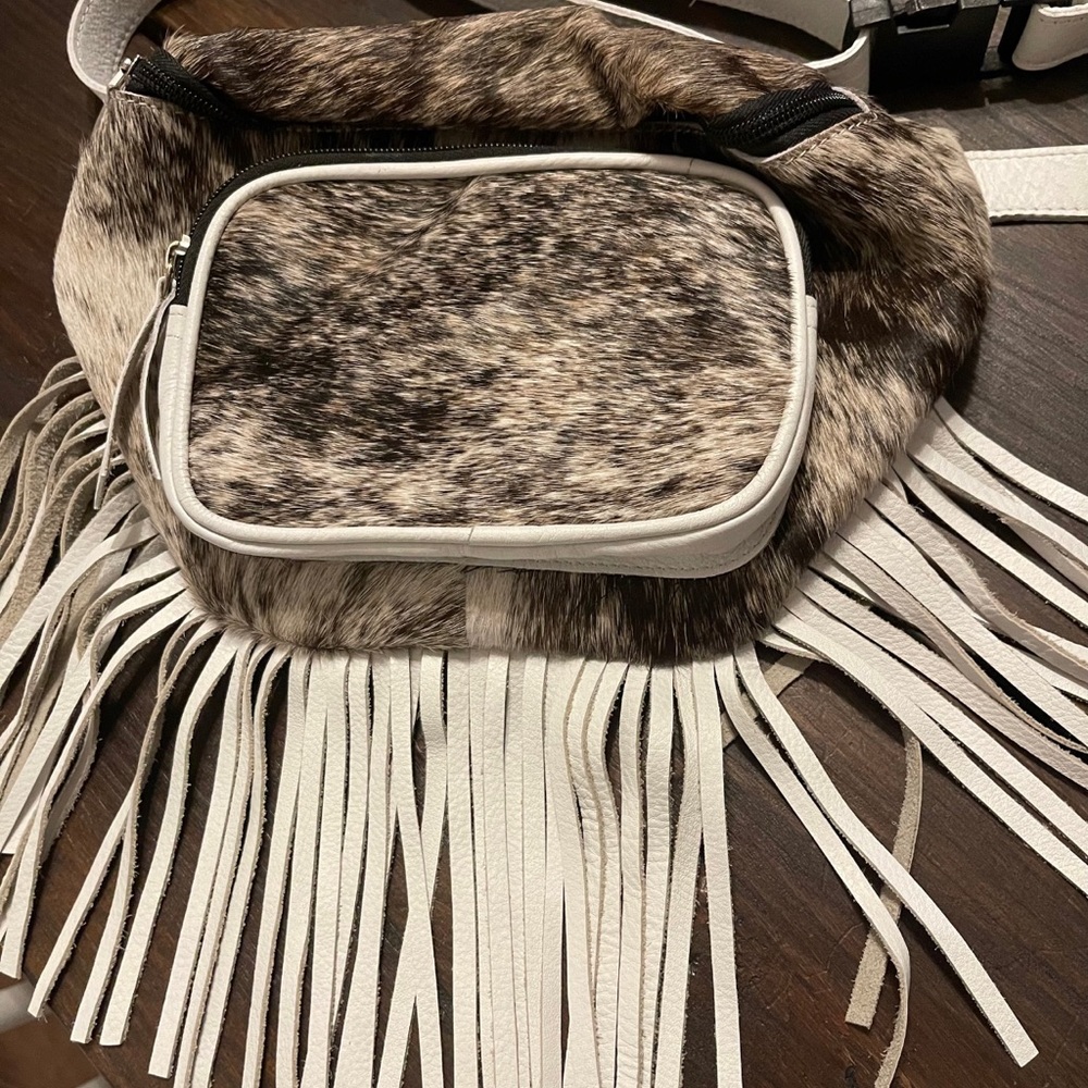 White fringe cowhide sling bag